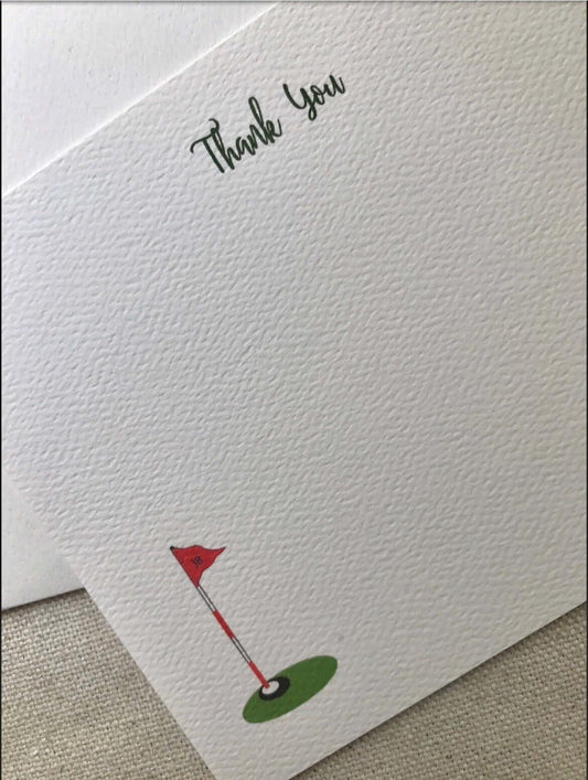 Golf-themed thank you note card with red flag illustration on textured white paper