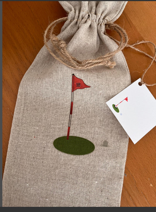 Linen drawstring gift bag with illustrated golf flag and green, rustic twine closure