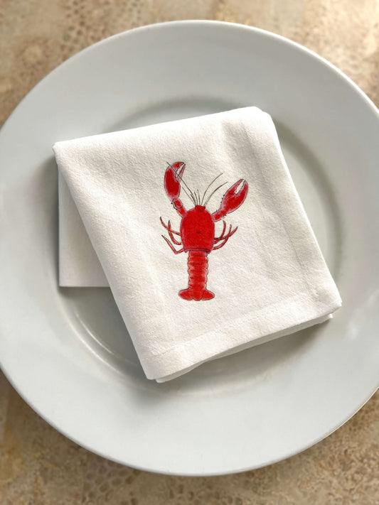 Lobster Party Bundle - Lobster-themed cotton napkin placed on a plate for a coastal dinner party.