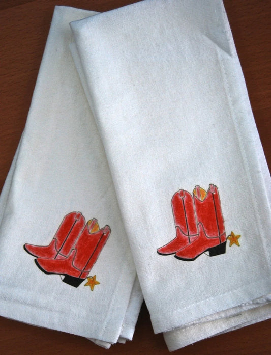 White cloth napkins with red cowboy boots and yellow star illustration, Happenstance Creations