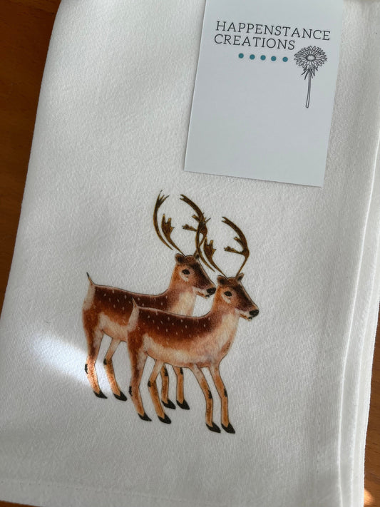 White tea towel with illustrated deer design, nature-inspired home decor for gatherings and gifts