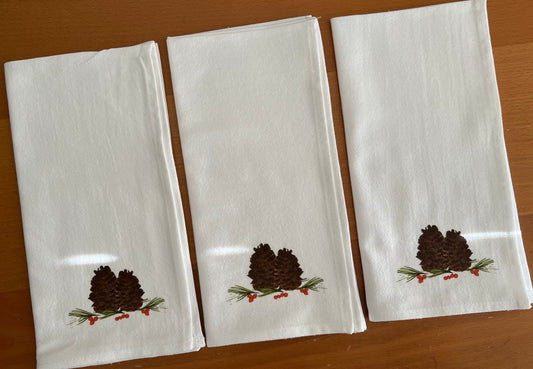 White cotton napkins with pinecone and berry print, nature-inspired table decor for gatherings