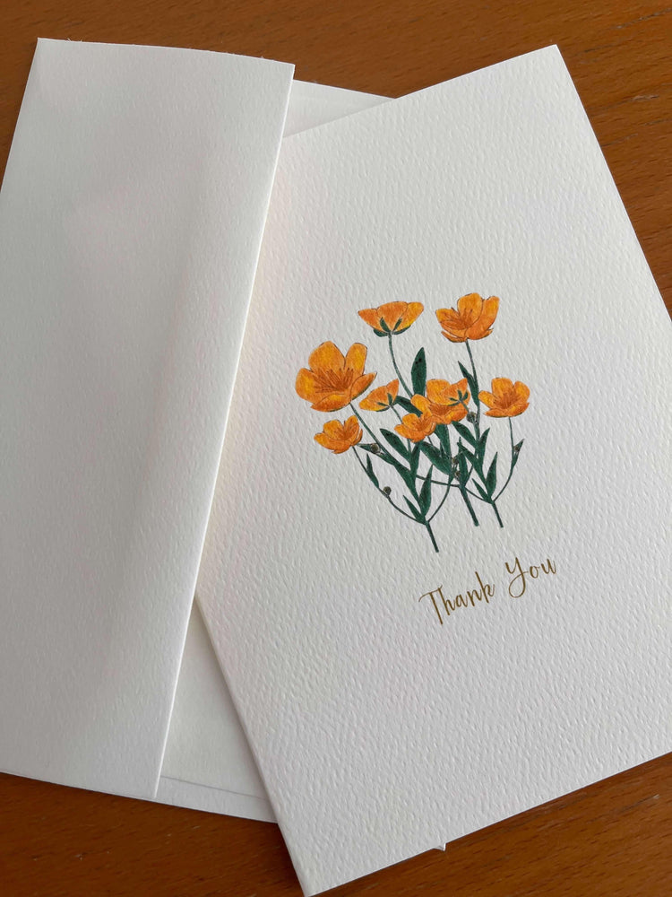 Eco-friendly thank you card with hand-illustrated orange flowers by Happenstance Creations