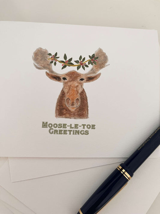 Moose illustration note card with 'Moose-le-toe Greetings' text, nature-inspired design for gifts and gatherings